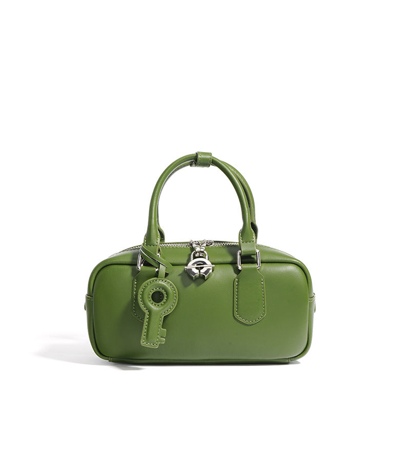 structured mini tote with key charm and top handles – NOLAR