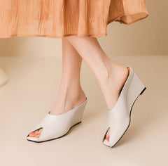 black leather wedge mules with open toe cutout – LUNARA