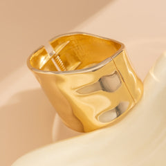 molten-edge gold cuff bracelet with sculpted silhouette – SORAYA
