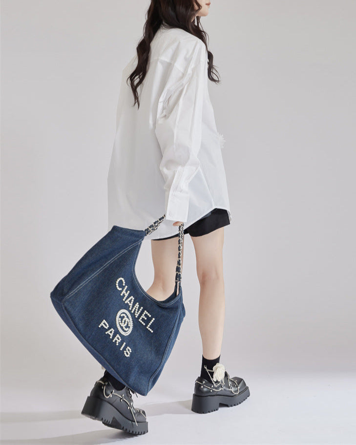 Relaxed fit shirt with floral embroidery - Elkura