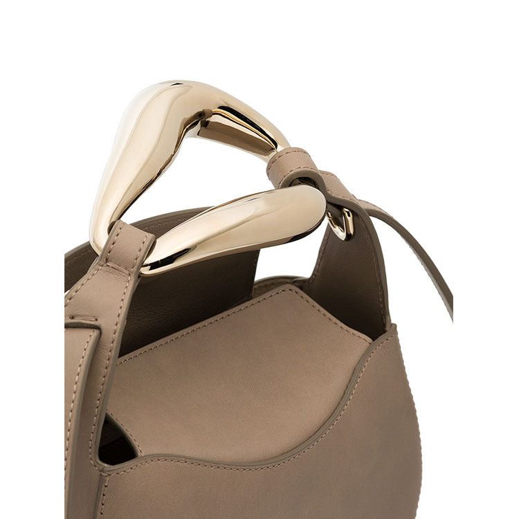 sculptural-handle saddle bag in tan leather – ARIS