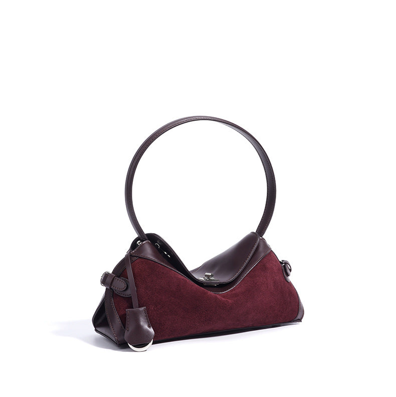 curved suede shoulder bag with flap closure – AURA