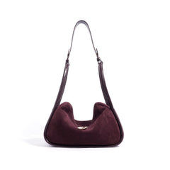 curved suede shoulder bag with gold twist lock – VIOLETTE