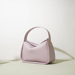 curved-edge shoulder bag with adjustable strap – LILA