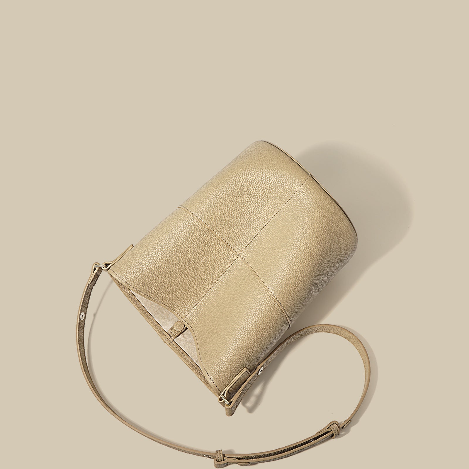 pebbled leather bucket bag with adjustable strap – NOQ