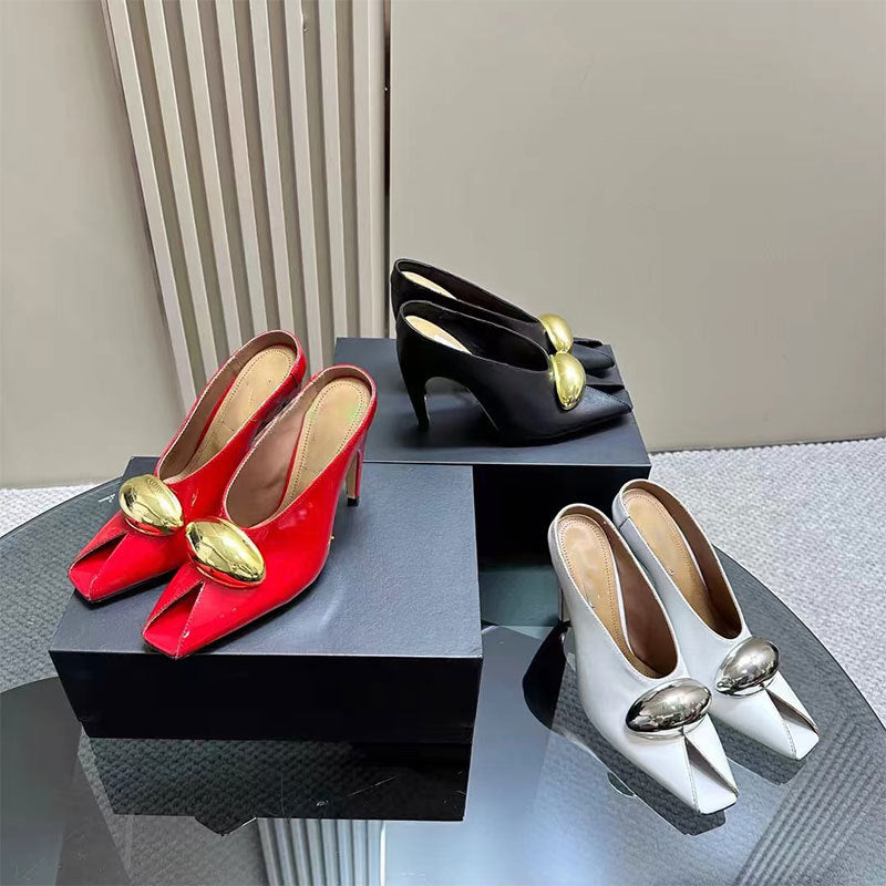 black leather mules with gold oval detail - LOMA