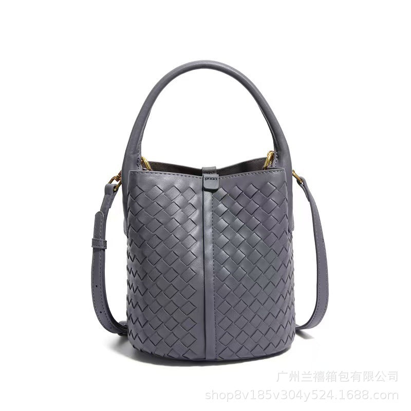 woven leather bucket bag with rounded handle – IVONY