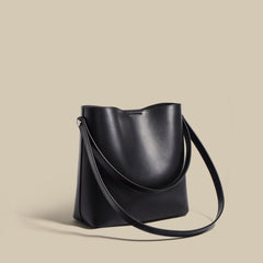 structured bucket bag with curved top edge – NOIW