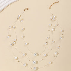 floating pearl strand necklace with layered illusion threads – AUIRO