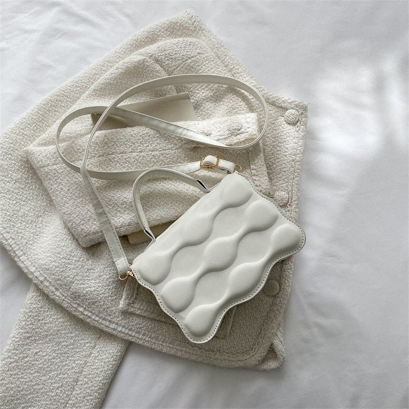 ripple wave mini crossbody bag with puffy green texture – LUMIA