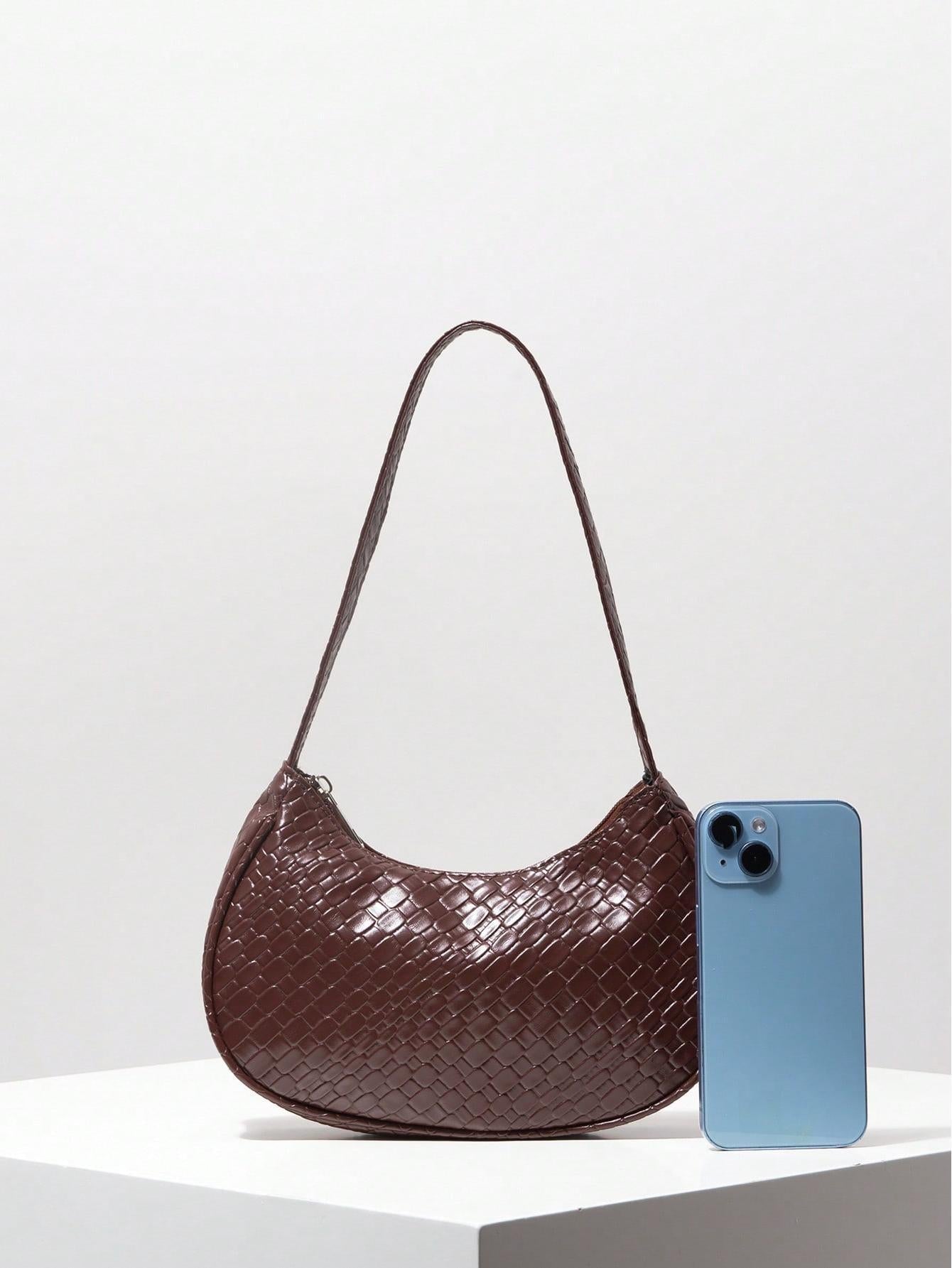 Crescent shoulder bag with woven leather finish - Munda