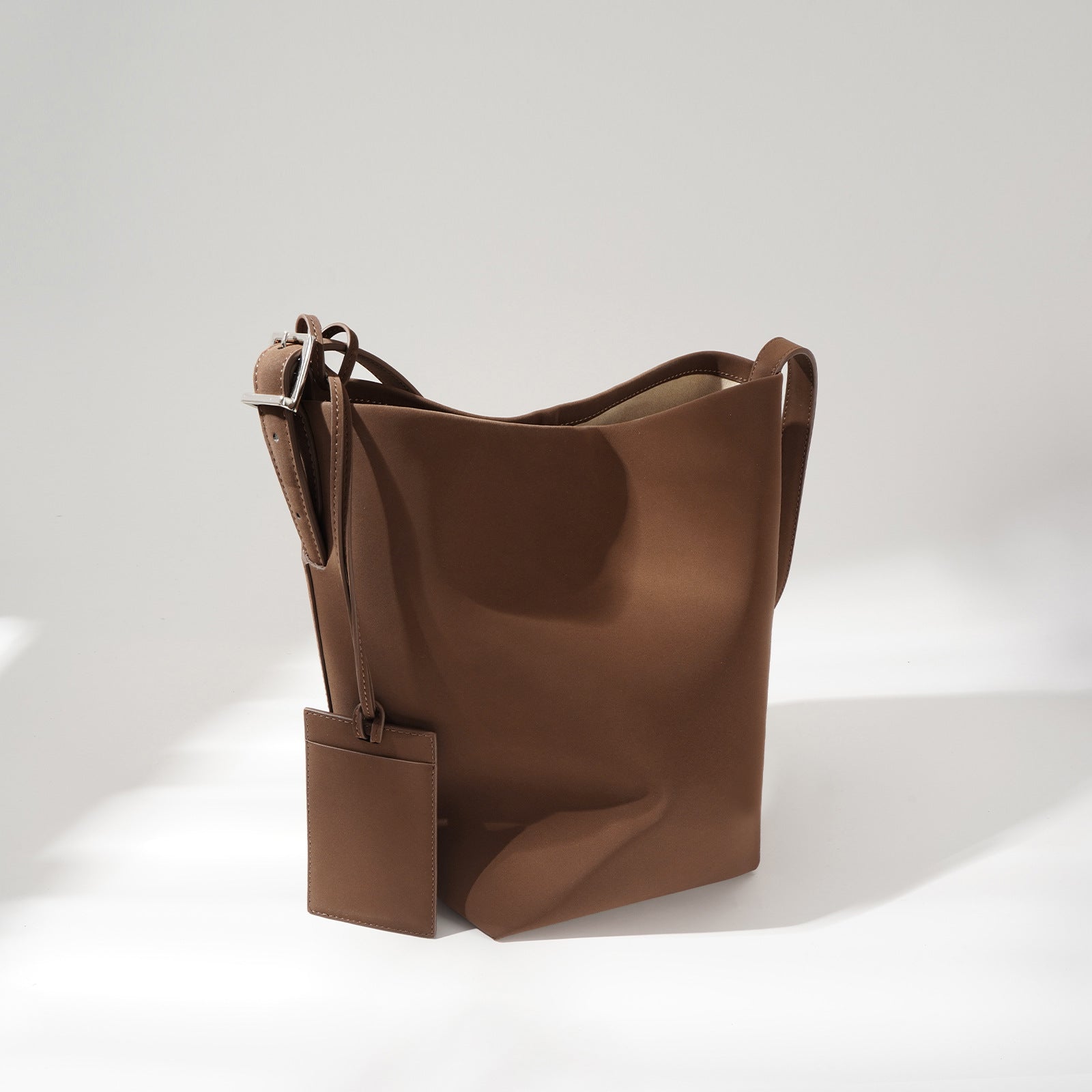 bucket shoulder bag with buckle strap and card tag - SORVA