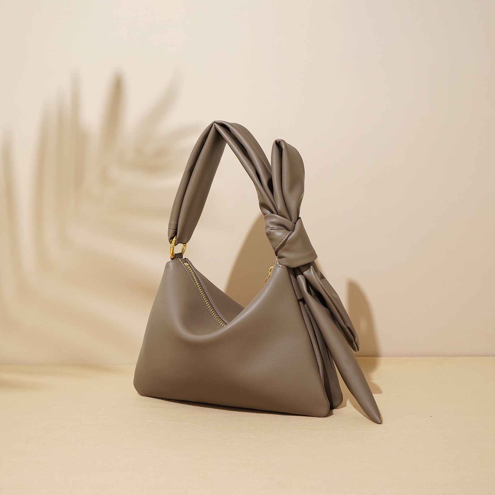 triangular shoulder bag with knotted handle detail – NAMRA