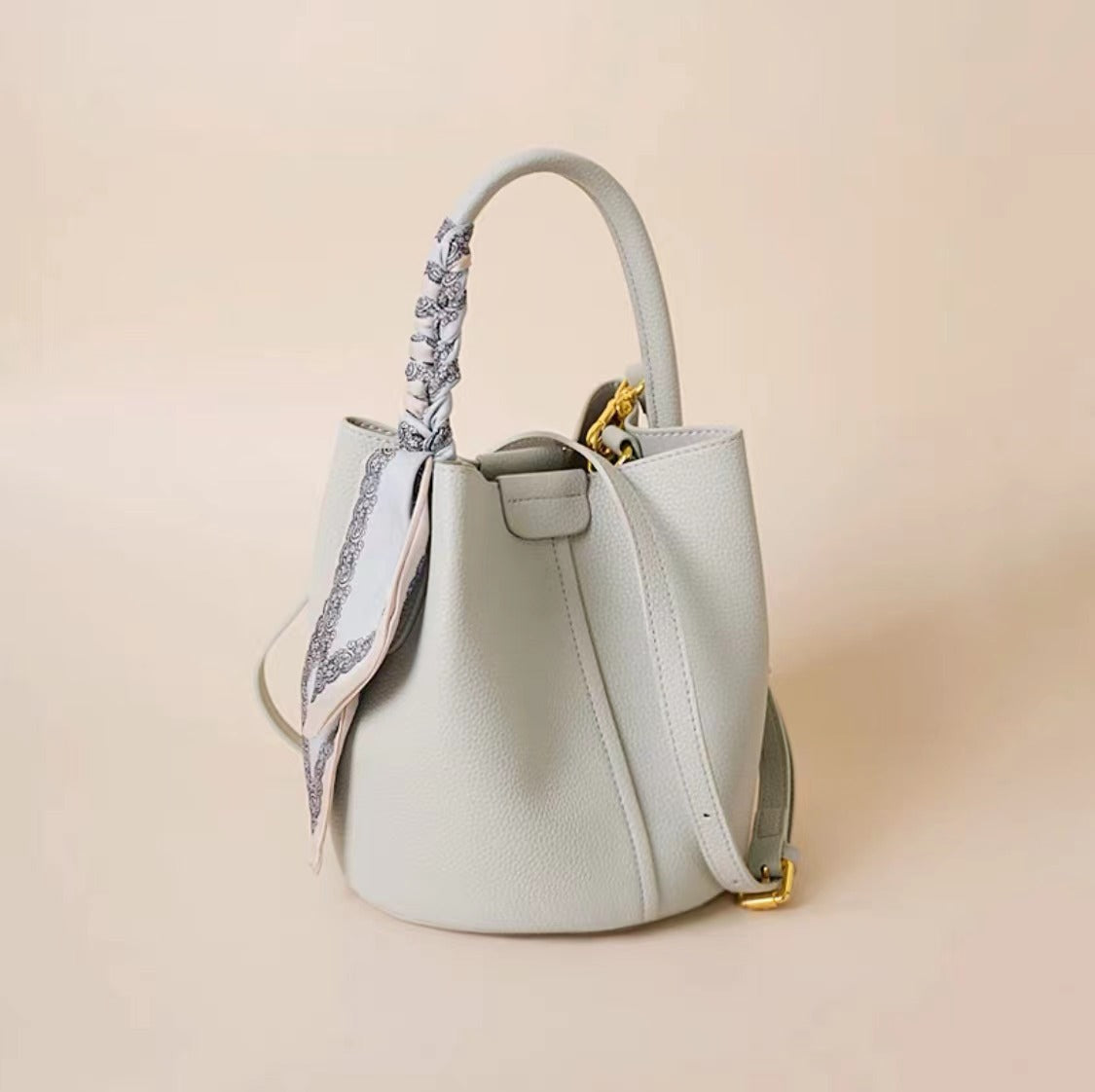pebble-textured bucket bag with printed scarf detail - NORPA
