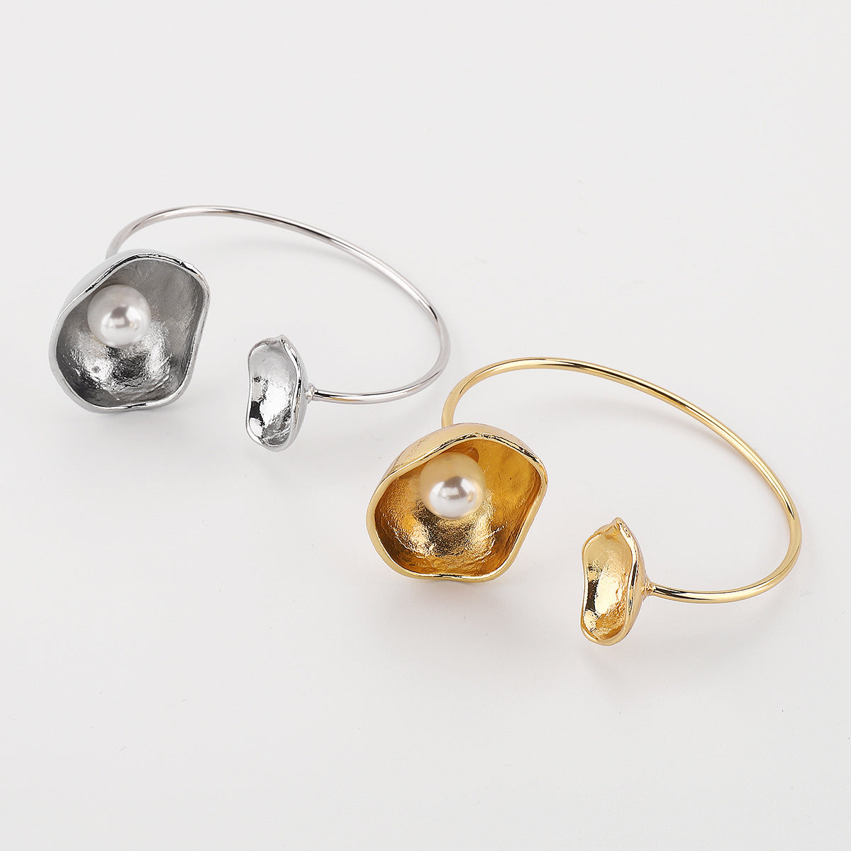 open cuff bracelet with abstract shell and pearl accent – NAIAS