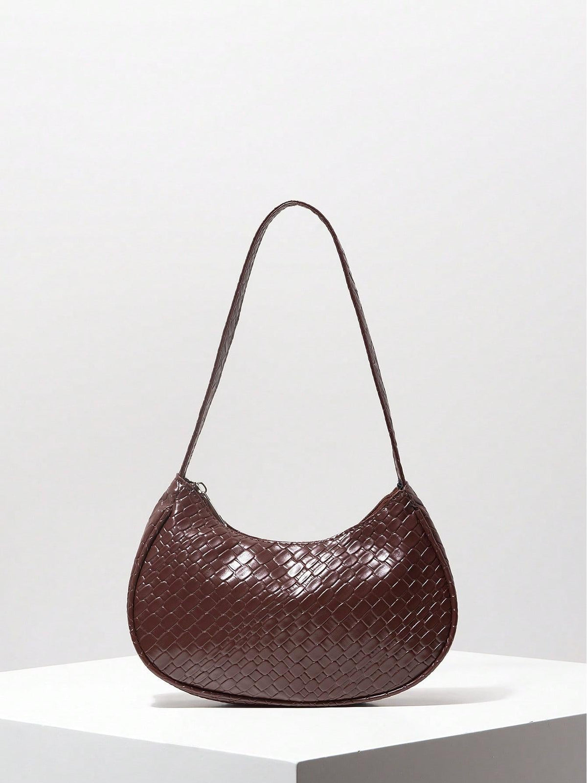 Crescent shoulder bag with woven leather finish - Munda