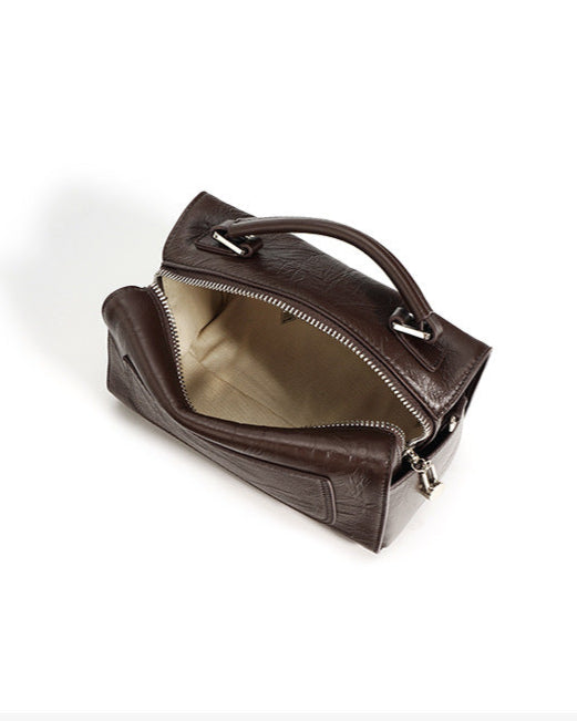 structured trapeze handbag with front patch pocket - NOXIR