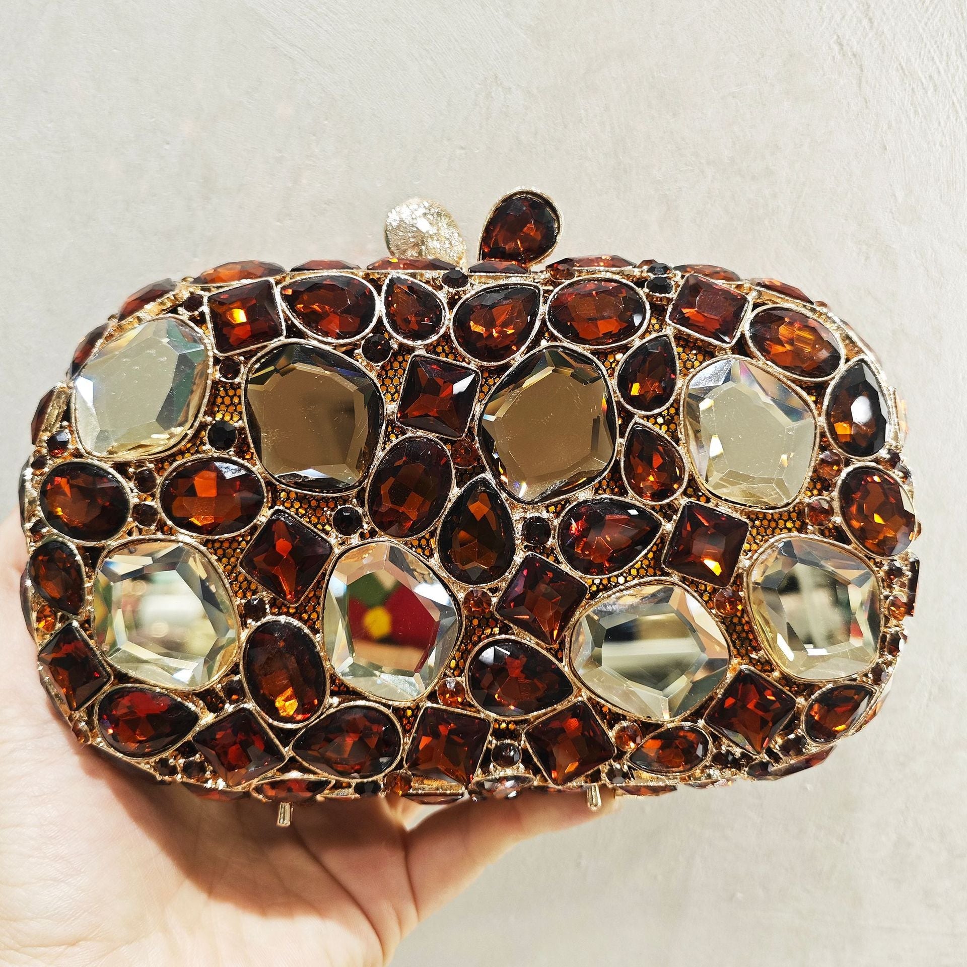 Elegant embellished clutch with geometric crystal accents - Onry