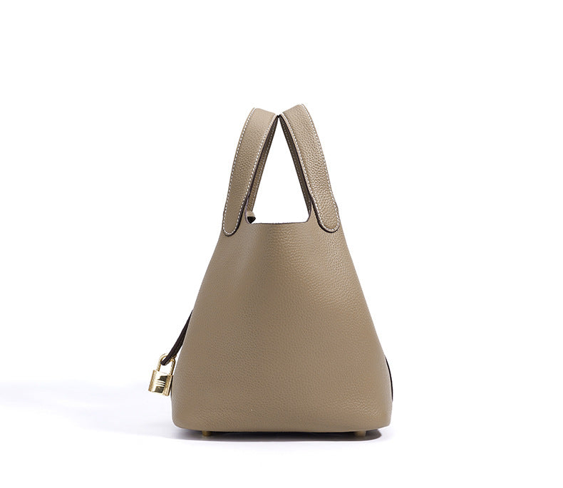 pebbled leather bucket bag with gold padlock – NOA