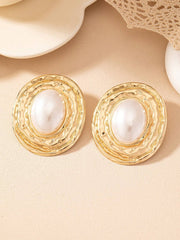 Textured oval stud earrings with pearl center – Lairi