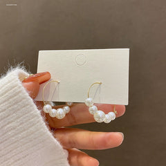 gold hoop earrings with graduated pearls – SENA