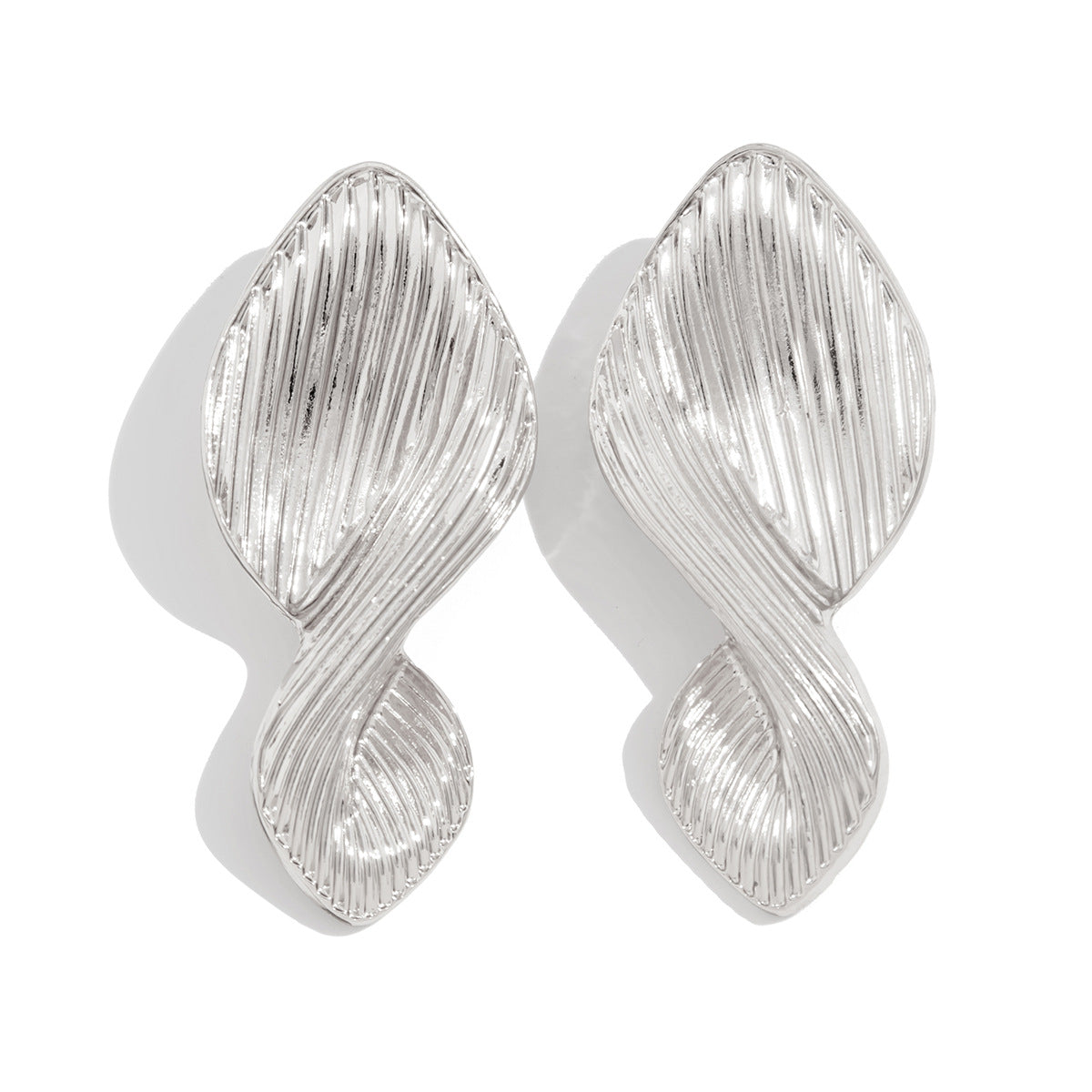 Textured leaf drop earrings with organic twist - Azina