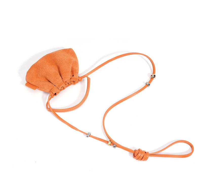 mini suede drawstring bag with top handle - ELVA