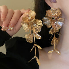 Cascading floral earring with crystal center – Broki