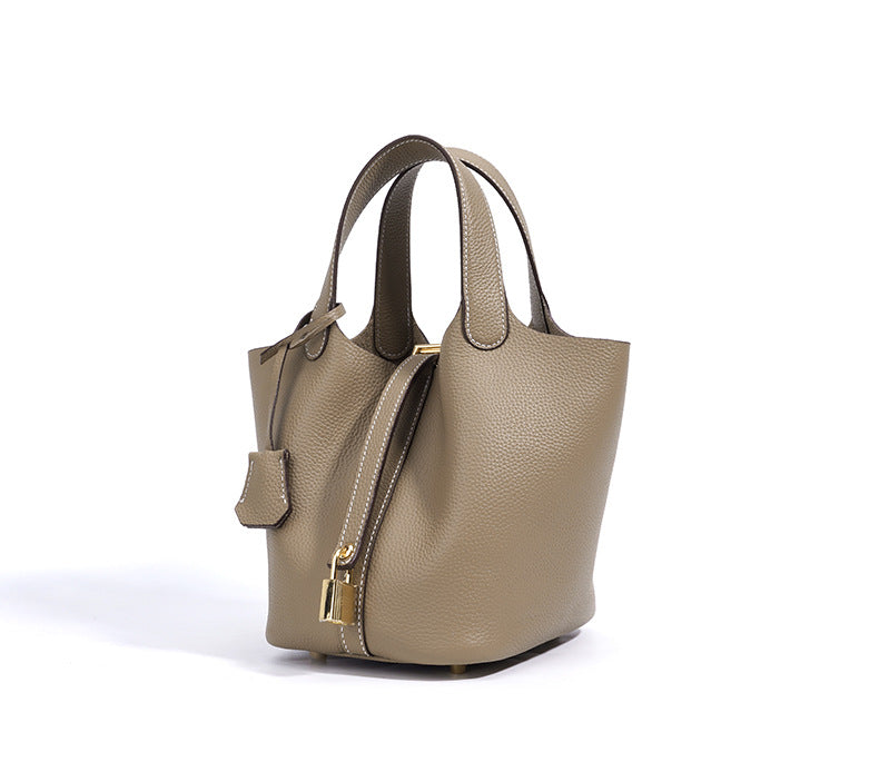 pebbled leather bucket bag with gold padlock – NOA