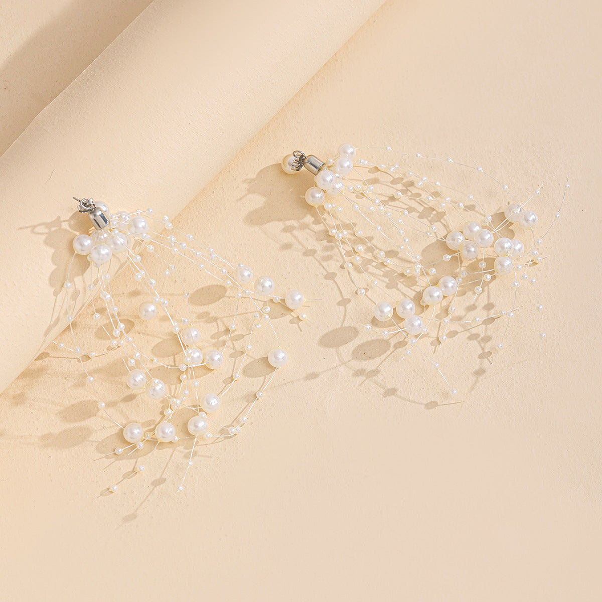 cascading pearl drop earrings with floating thread strands – LUNARIA