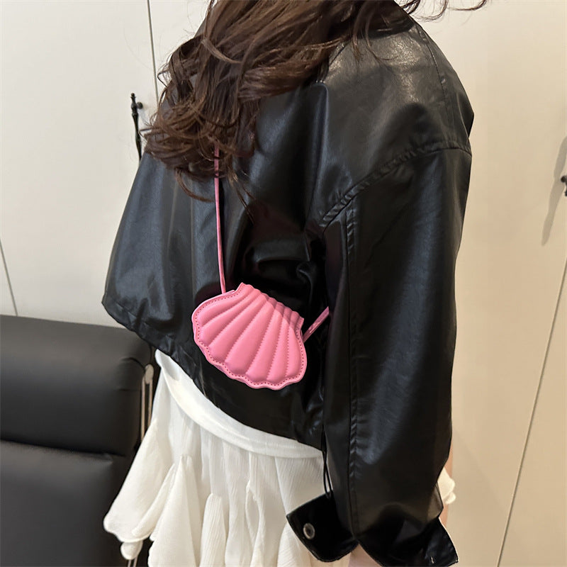 seashell leather crossbody bag in coral orange – MAREA