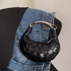 woven crescent bag with sculpted gold handle – AURELIA