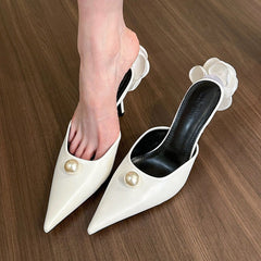ivory pointed mules with pearl accent and floral heel – VELINA