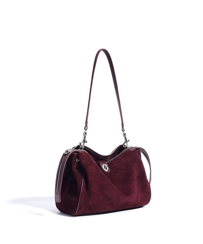 suede shoulder bag with curved zipper detail – TERRA