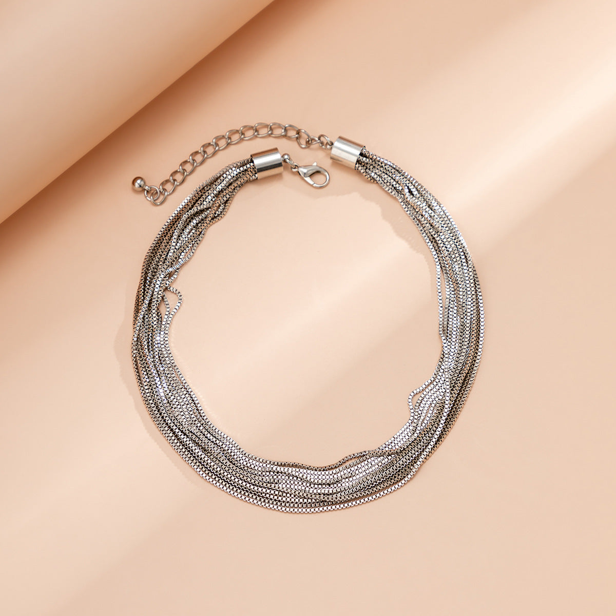 Multi-strand chain necklace with textured layers - Nimlu