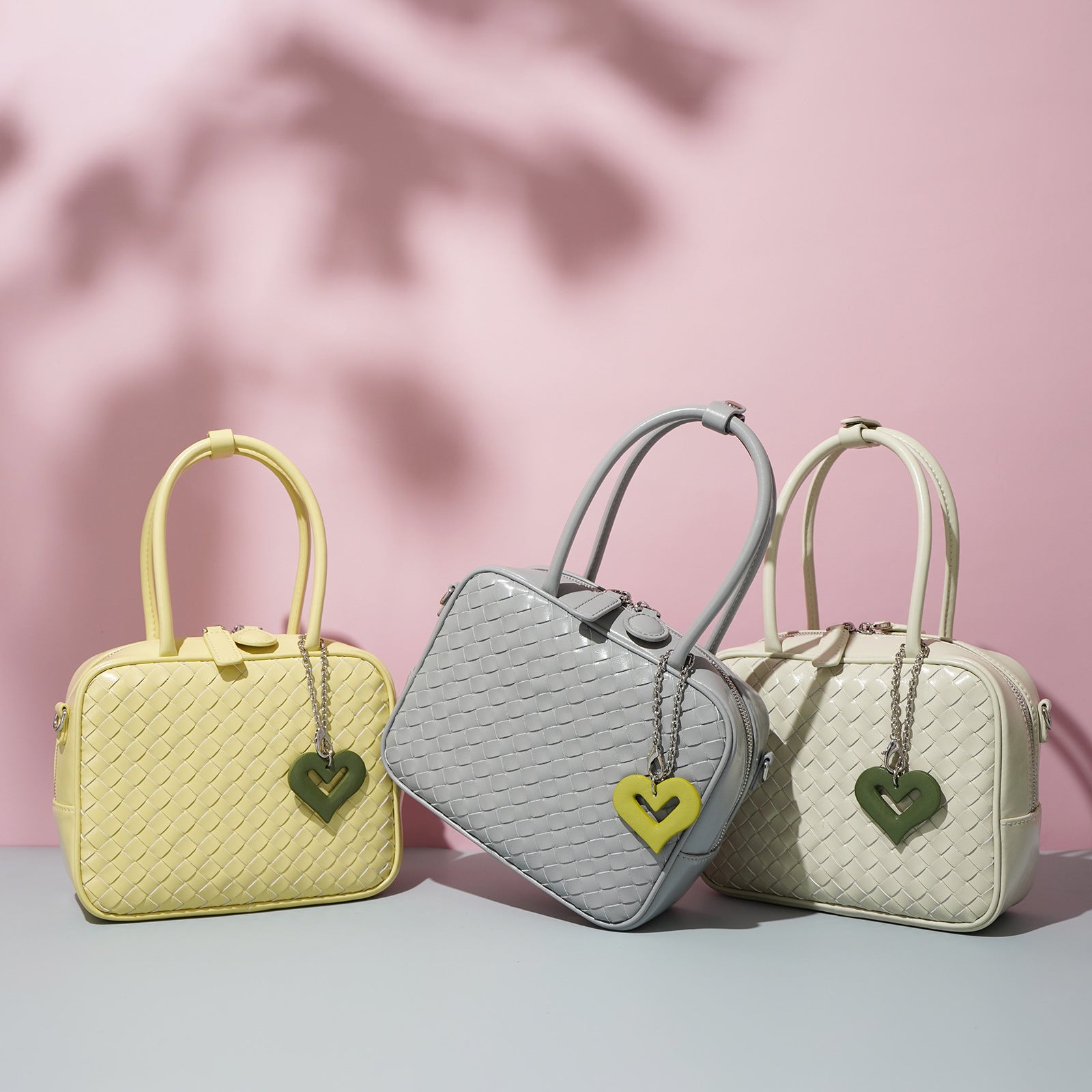 woven leather handbag with heart charm – AMORA