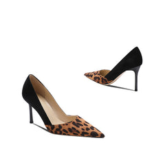pointed-toe pumps with leopard print and black suede contrast - Solado