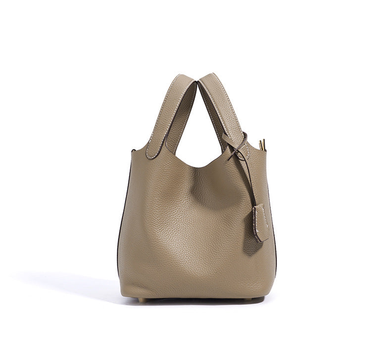 pebbled leather bucket bag with gold padlock – NOA
