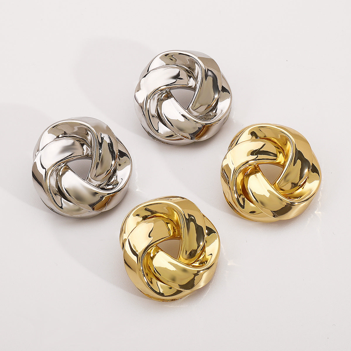 twisted dome stud earrings with polished finish – SELMAR