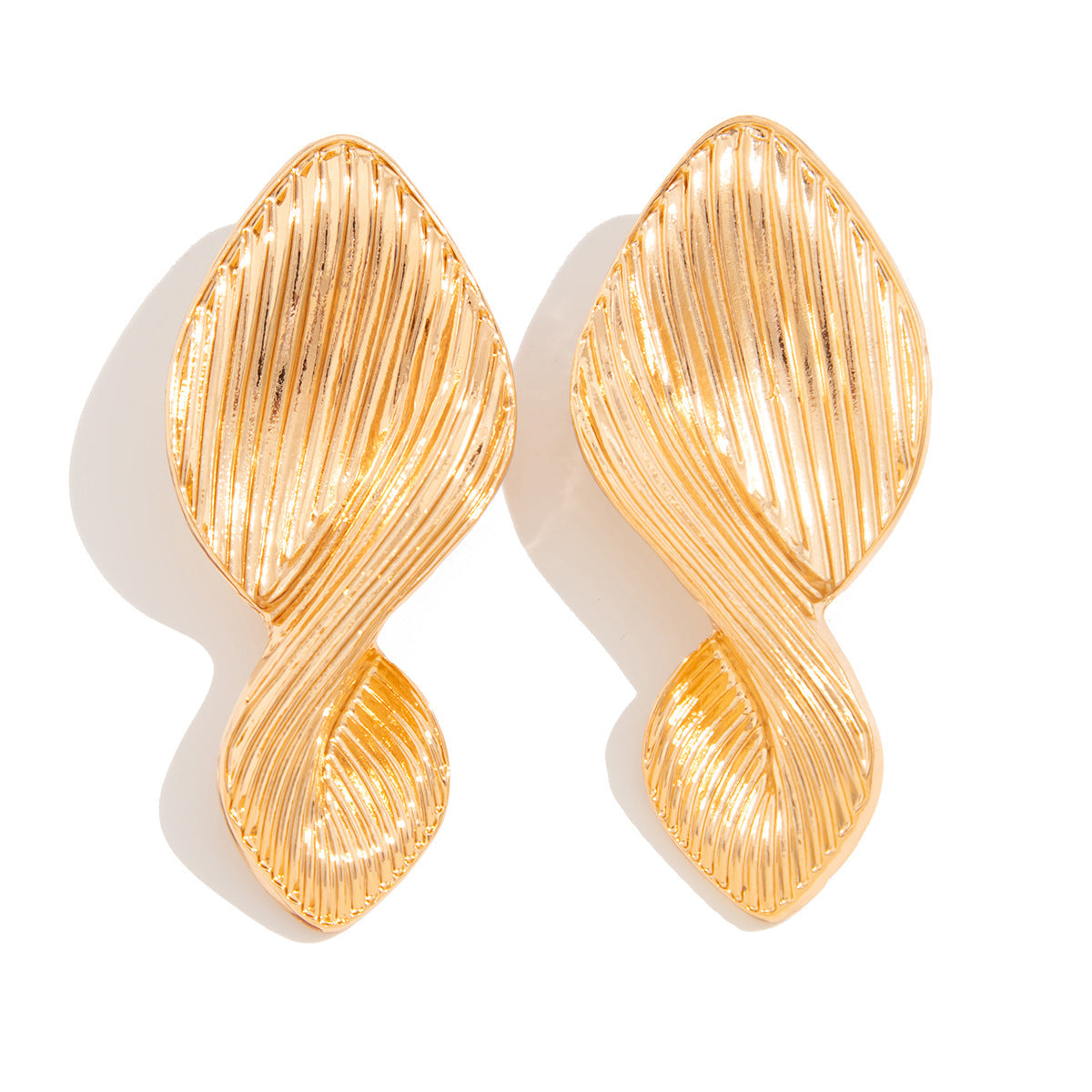 Textured leaf drop earrings with organic twist - Azina