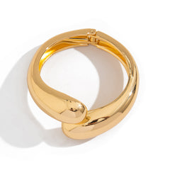 sculpted gold cuff bracelet with fluid twist – ARYIY