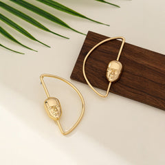 Gold abstract face earrings with geometric hoop frame - Avra