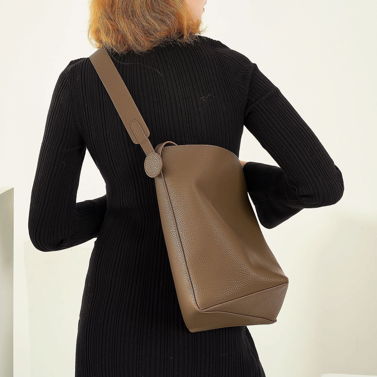 tall leather bucket bag with circular tab – OLIVE