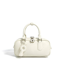 structured mini tote with key charm and top handles – NOLAR