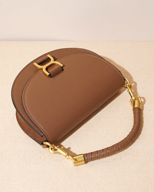 half-moon crossbody bag with top handle and metal buckle - NOLAM