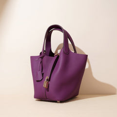 pebbled leather bucket bag with gold padlock – NOA