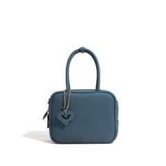 black boxy handbag with heart charm – LYRA