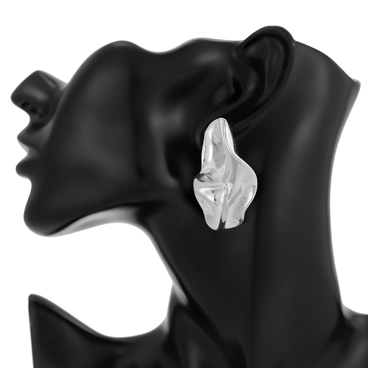 abstract sculpted stud earrings with melted metal finish - Nayam
