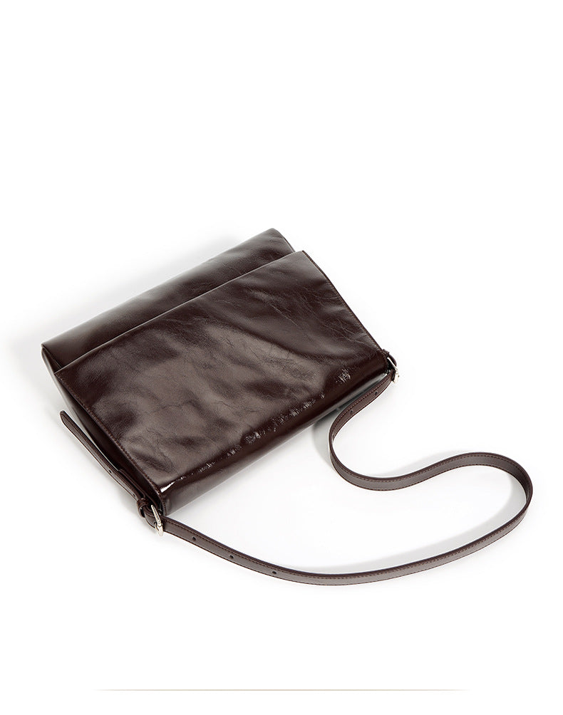 fold-over shoulder bag in glossy leather - KAIR