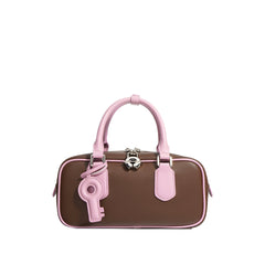 structured mini tote with key charm and top handles – NOLAR